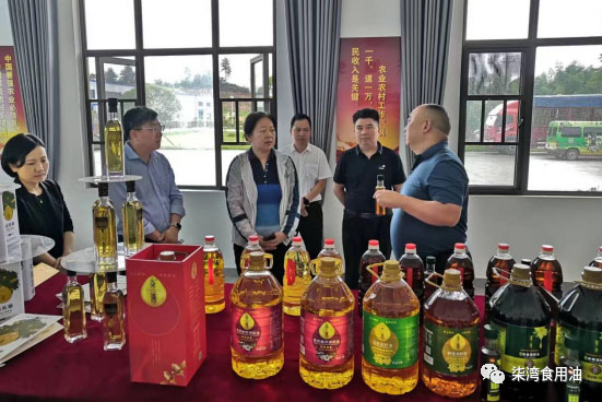 国家天气中心、中国农业科学院来临湘调研油茶气象效劳事情